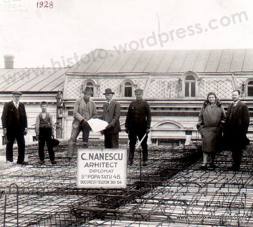 Architect, builders' crew and proprietors on a 1928 building site
