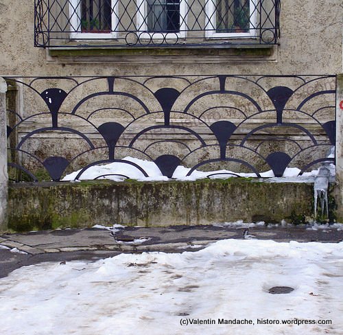 Art Deco glowing Suns fence, Bucharest