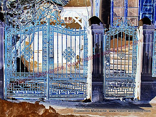 Neo-Romanian style wrought iron gate