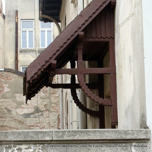 Neo-Romanian doorway awning